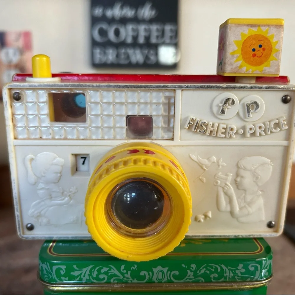 Fisher-Price #784 Classic Toy Story Camera 8 picture frames. 1960’s Fully works